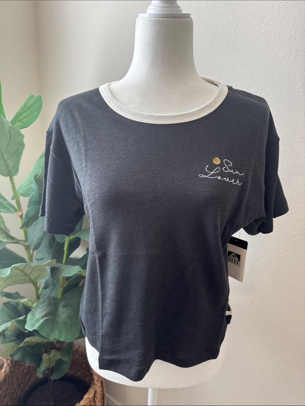 Reef Black Short Sleeve Tee with White Trim & Yellow Sun Embroidery